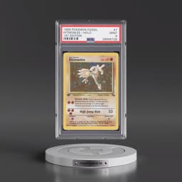1999 Pokémon Fossil #7 Hitmonlee - 1st Edition Holo (PSA 9 MINT)